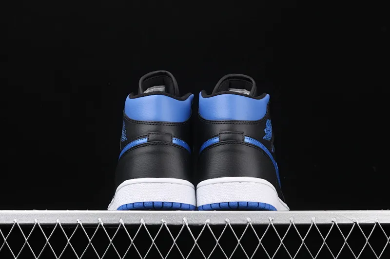 All categories Air Jordan Jordan series basketball shoes Air Jordan 1 Mid Air Jordan 1 Mid AJ1 Joe 1 mid-top black and blue basketball shoes 554724-068